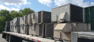 Air conditioning units on a flatbed truck