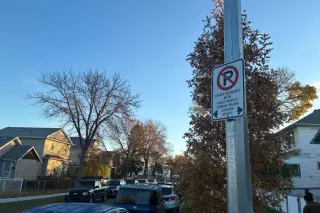 A sign restricting parking to residents with permits