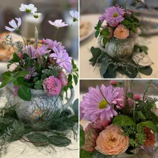 Three floral arrangements with pink, purple, and peach flowers in decorative vases on a table.