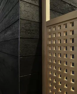 Detail image of Japanese-inspired design which includes Shou Sugi Ban (charred) wood siding and delicate wood joinery at Hiro Sushi.