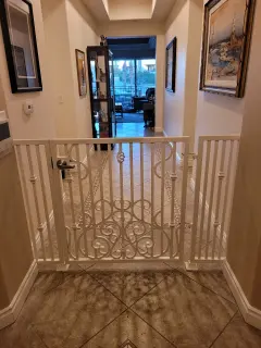Custom white ornamental interior gate with decorative scrollwork — Vegas Weld-It!