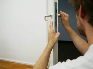 Man working on a lock