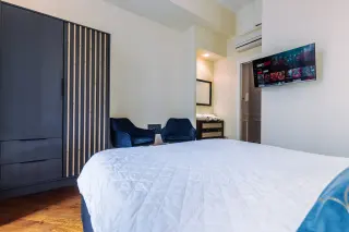 Camera da letto elegante del Saint John Loft