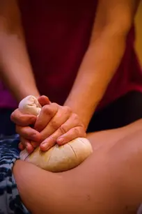 Abdominal massage with herbal compress by Six Elements Bodywork